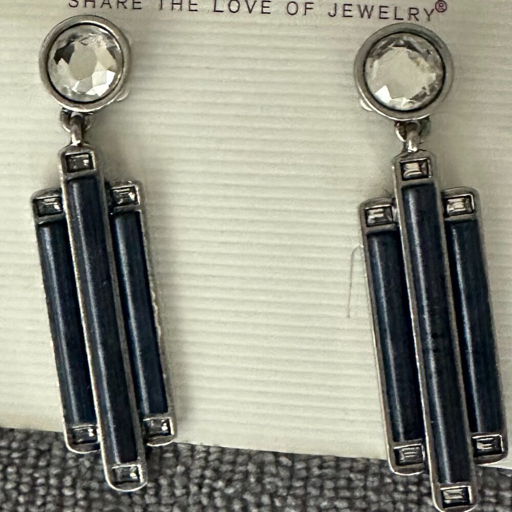 Lia Sophia geometric Art Deco-inspired design with navy blue column